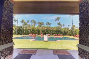 a view of a swimming pool from the lobby of a resort at Aina Nalu in Lahaina