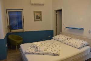 Ένα ή περισσότερα κρεβάτια σε δωμάτιο στο Vila Nada +54 φωτογραφίες
