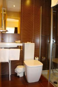 Koupelna v ubytování Hotel Alda Entrearcos