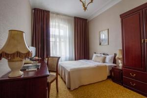  Кровать или кровати в номере Гостиница Будапешт 