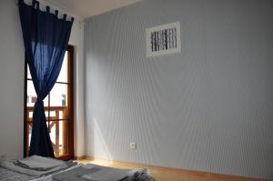 Postel nebo postele na pokoji v ubytování Kubiczówka