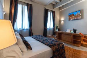 Voodi või voodid majutusasutuse The Code Hotel toas