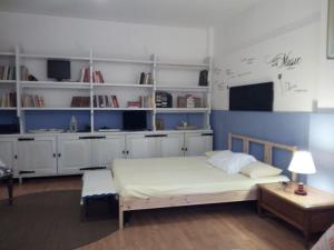 Кровать или кровати в номере Casa Tellina lungomare scogliera