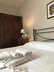 A bed or beds in a room at Appartamenti San Rocco