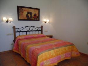 A bed or beds in a room at Alojamientos Rurales La Higuerilla Sierra de Cazorla
