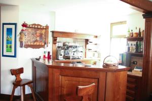 Sohvabaar või baar majutusasutuses Locanda Aurora B&B