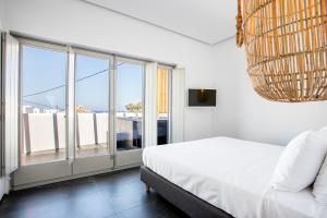 Llit o llits en una habitació de Aegean Gem