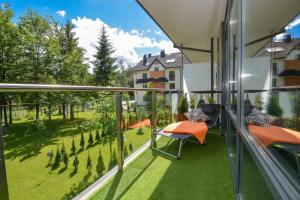 Vonkajšia záhrada v ubytovaní VIP Apartamenty Szklane Domy The View