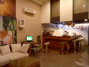 Telewizja i/lub zestaw kina domowego w obiekcie Niuniu & Meng Ka Homestay