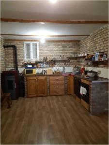 Kuchyň nebo kuchyňský kout v ubytování Guest House Mundzic- Sumski Mir