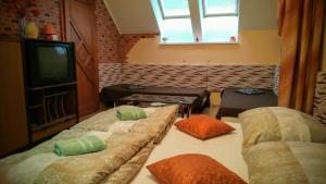 A bed or beds in a room at Apartmán Slnečnica