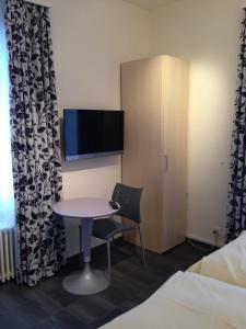Sjónvarps- og/eða afþreyingartæki á Hotel Central