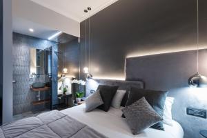 Voodi või voodid majutusasutuse LuMa Suite Via Veneto - Your luxury style 22 toas