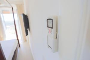 a gas meter on the wall of a room at ARGENTARIO Laura's POOL VILLA in Porto Ercole