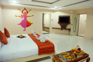 Postel nebo postele na pokoji v ubytování Athena Hotel