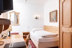 Postel nebo postele na pokoji v ubytování Hotel Bären