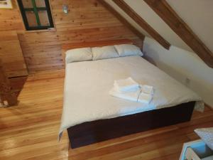 Postel nebo postele na pokoji v ubytování Apartman rico