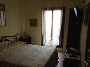 Posteľ alebo postele v izbe v ubytovaní Hotel Locanda Salieri
