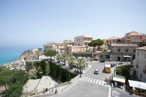 an aerial view of a street in front of the ocean at Il Duca in Tropea