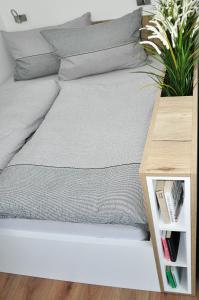 Postel nebo postele na pokoji v ubytování Apartmány Stožec - Gabreta Premium