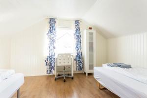 Кровать или кровати в номере Fjord View Apartments