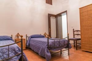Postel nebo postele na pokoji v ubytování B&B Le Balate + 36 fotografií