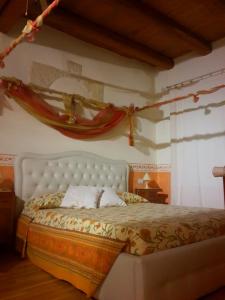 a bedroom with a white bed in a room at Cagliari Dream in Cagliari