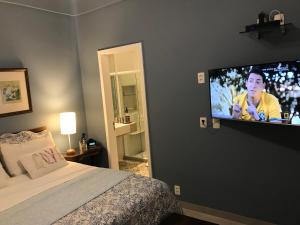 Ένα ή περισσότερα κρεβάτια σε δωμάτιο στο Anexo Ipanema +33 φωτογραφίες