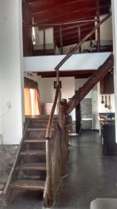 a staircase in a room with a bunk bed at Casa El Mortero in Cafayate