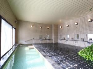 Bazén v ubytování Hotel Silk Inn Madarao nebo v jeho okolí