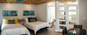Ένα ή περισσότερα κρεβάτια σε δωμάτιο στο Morel Executive Suites