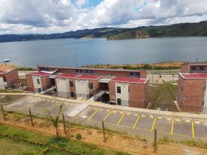 a row of buildings next to a large body of water at Calima Darien in Calima