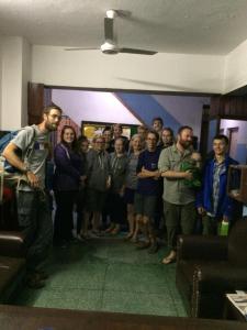 a group of people standing in a room at hotel Backpackers inn in Kathmandu