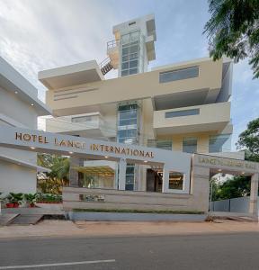 a large building with a hotel lane international at Hotel Lance International in Nāgercoil