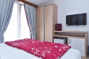 TV a/nebo společenská místnost v ubytování Hotel Grbalj
