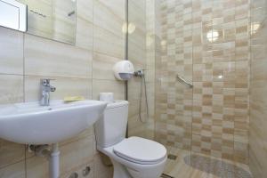 Koupelna v ubytování Hotel Grbalj