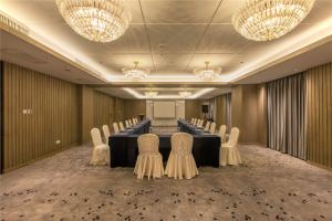 A área empresarial e/ ou a sala de conferências de Wuhan Hongguang Hotel