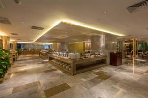 Uma área de estar em Wuhan Hongguang Hotel
