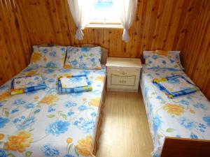 Cama o camas de una habitación en Guesthouse on Pushkina 10
