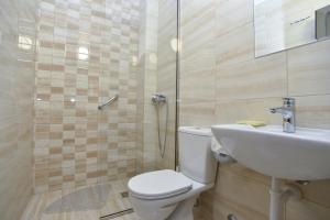 Koupelna v ubytování Hotel Grbalj