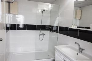 Koupelna v ubytování Arsen Hotel