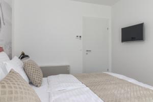 Posteľ alebo postele v izbe v ubytovaní Luxury Apartments Magali 2