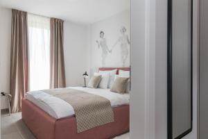Posteľ alebo postele v izbe v ubytovaní Luxury Apartments Magali 2
