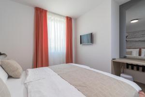Posteľ alebo postele v izbe v ubytovaní Luxury Apartments Magali 2