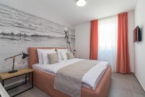Säng eller sängar i ett rum på Luxury Apartments Magali 2