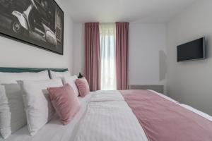 Posteľ alebo postele v izbe v ubytovaní Luxury Apartments Magali 2