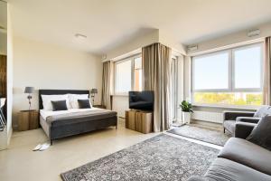Posteľ alebo postele v izbe v ubytovaní LuxLux Apartments Afara
