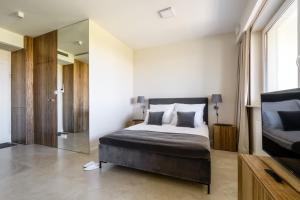 Posteľ alebo postele v izbe v ubytovaní LuxLux Apartments Afara