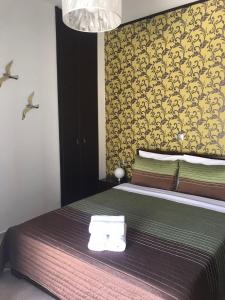 Posteľ alebo postele v izbe v ubytovaní Kima Stegna sea view