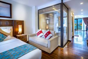 Postel nebo postele na pokoji v ubytování Sapa Relax Hotel & Spa